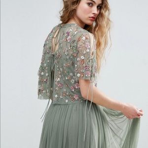 Needle and thread embellished top